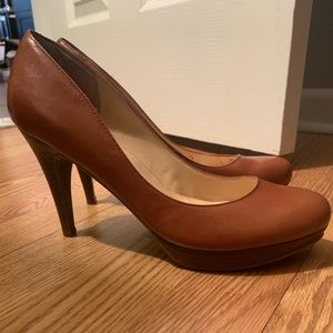 Brown leather pumps